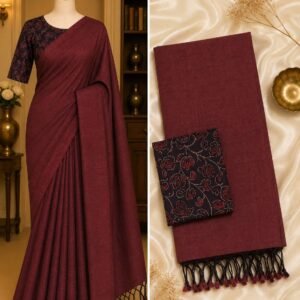 rich maroon handloom Khadi cotton saree with contrasting sage green floral printed blouse fabric